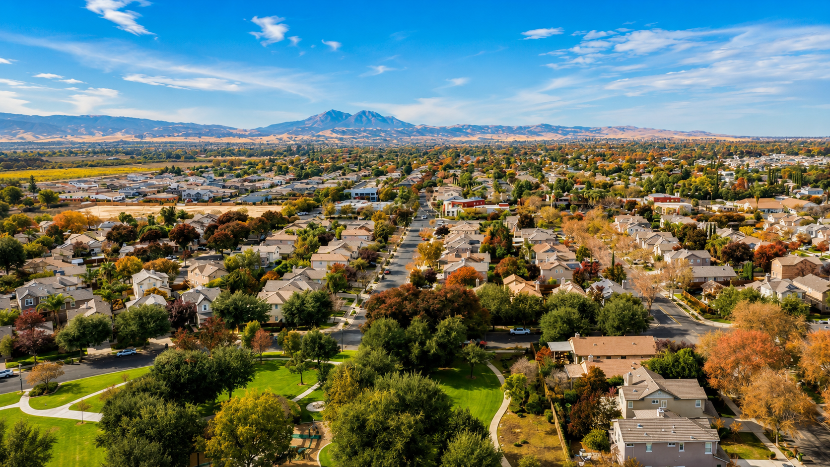 Aerial view of Brentwood residential neighborhoods with parks and mature landscaping